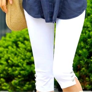 Two pairs of capris, one Jean and the other white never worn look amazing on